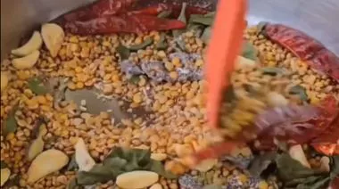 Homemade sambar premix and prepared sambar in a bowl